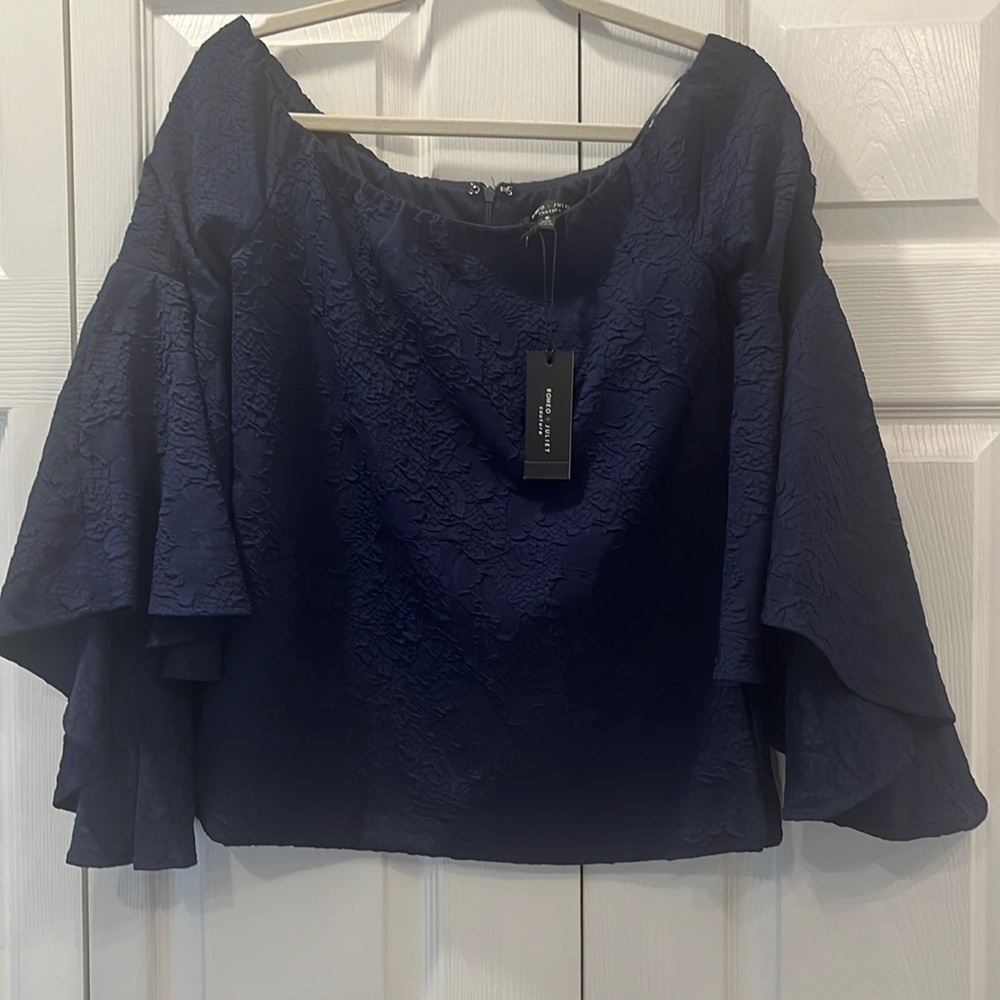 Navy blue layered sleeve shirt. Brand new in perfect condition